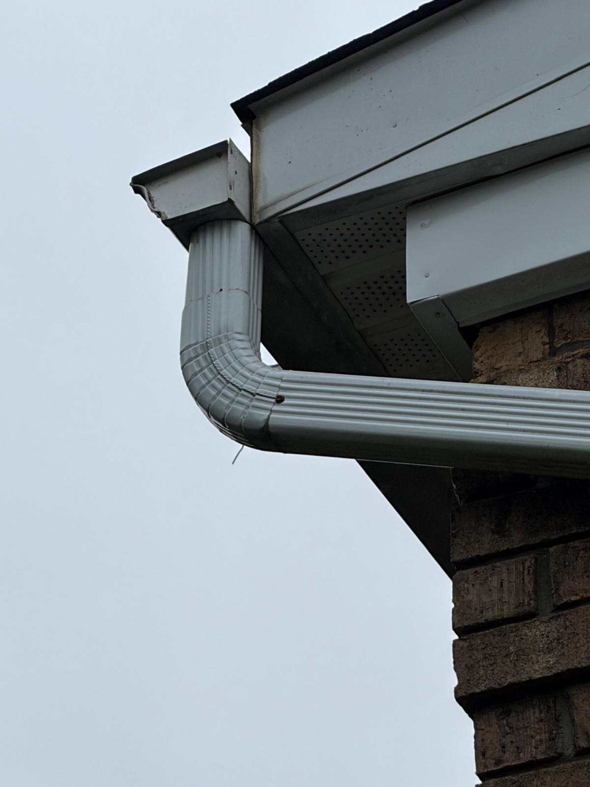 Downspouts — after